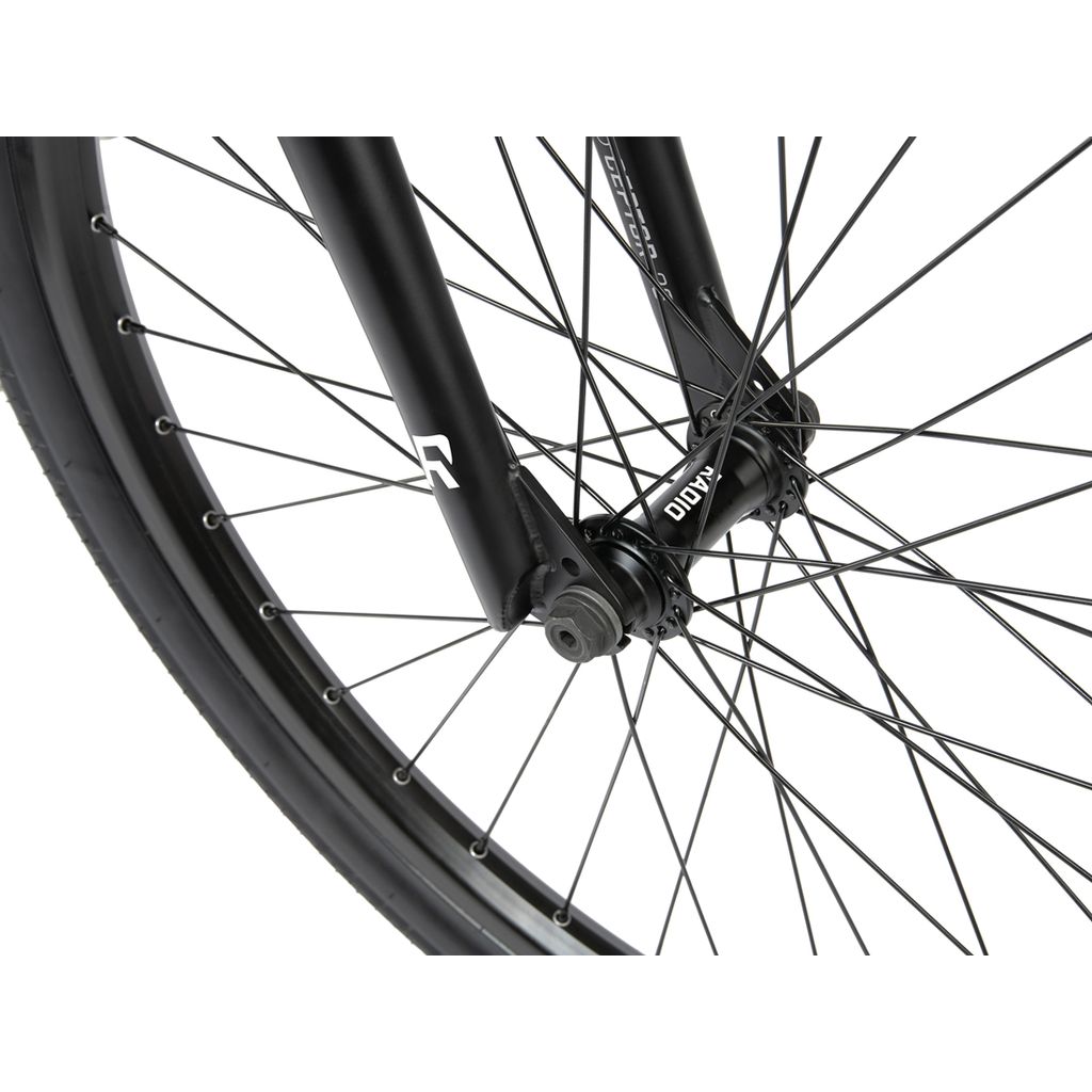 Close-up view of the front wheel and fork of a Radio 26 Inch Ceptor Bike, showing spokes, hub, and tire details. Equipped with sealed bearings for smooth rides.