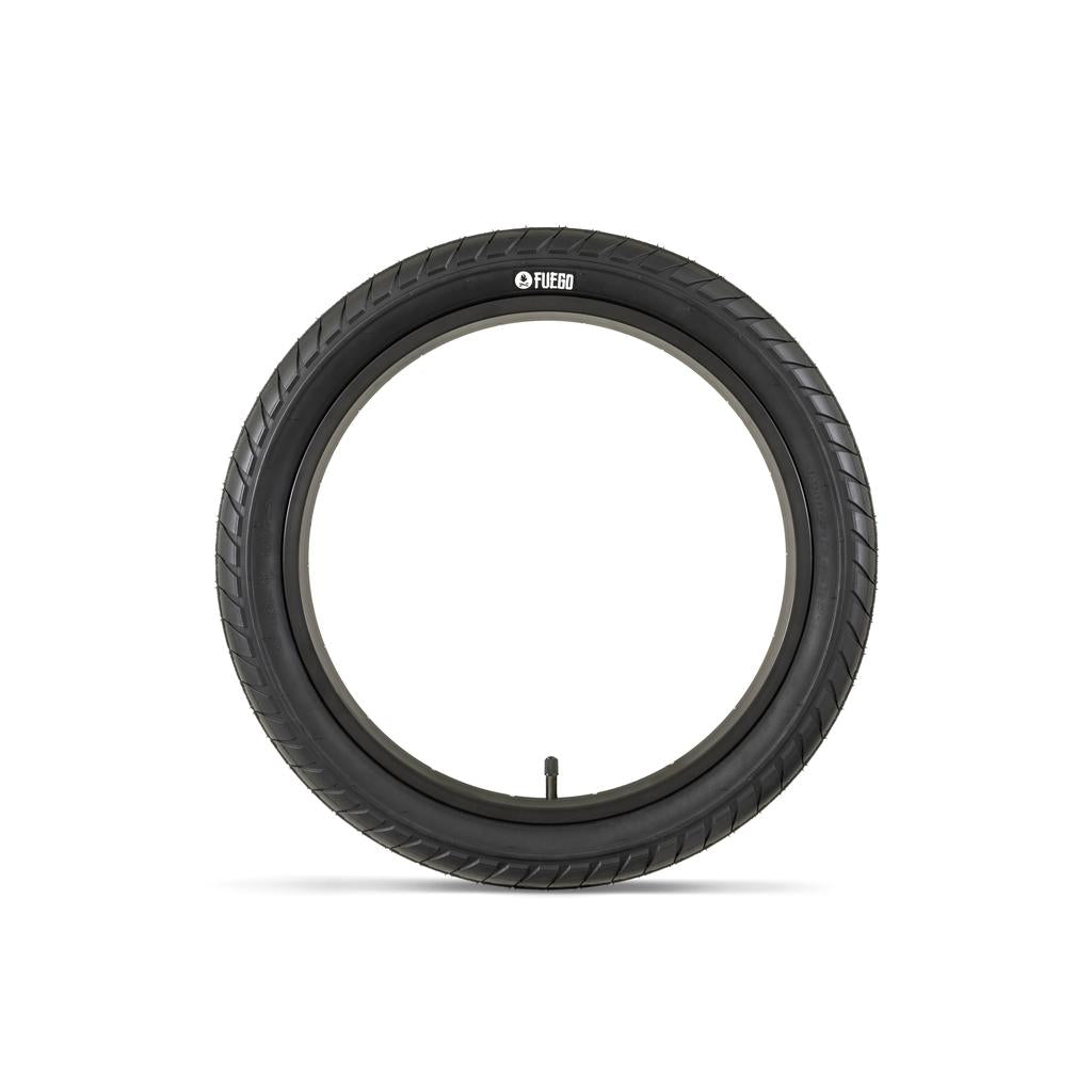 The Fly Bikes Fuego Tyre, a black bicycle tire celebrated for its puncture resistance and versatile tread pattern, is showcased on a white background.