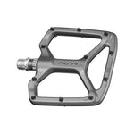 Introducing the Funn Python V2 Alloy Pedals: These metallic bicycle pedals feature a wide, open-frame design with small traction pins at the edges, ensuring superior performance and enhanced stability for every ride.