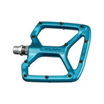 The Funn Python V2 Alloy Pedals have a teal color with a sleek, open-frame design made from durable AL6061 alloy, featuring metal pins for grip and a silver spindle.