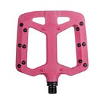 The Funn Taipan Pedals boast a pink rectangular design with numerous black pins around the edges, offering enhanced traction and durability for your ride.