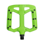 Funn Taipan Pedals feature a bright green platform with multiple black pins for superior grip. Each pedal is designed for durability with a robust black spindle, ensuring long-lasting performance on every ride.