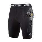 The G-Form EX-1 Bike Short Liner is a pair of black padded compression shorts with impact protection for the thighs and hips, ideal for multi-sport use. The brand "G-FORM" is prominently displayed on the waistband.