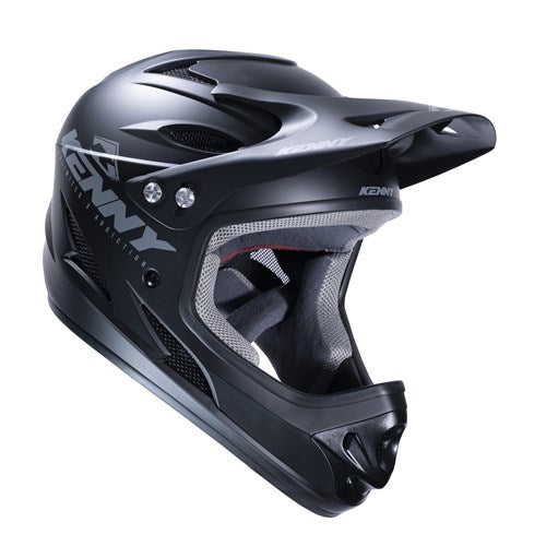 The Kenny Racing Downhill Helmet in Solid Matte Black is a full-face BMX helmet with a visor and vents. Featuring the "Kenny" brand logo, it meets Australian safety standards, ensuring protection for your thrilling rides.