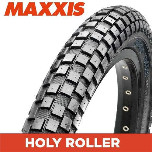 The Maxxis Holy Roller Tyre, with its unique knobby tread design, shines against a white background as a versatile performer.