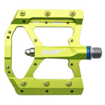 The HT AE05 Pedals, in a vibrant lime green, are crafted from CNC aluminium and come with a silver spindle and EVO+ bearings. They feature multiple screw-in, replaceable pins to ensure optimal grip.