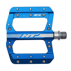 The HT AE12 Pedals are blue bicycle pedals made with CNC aluminum and metal studs, featuring the advanced EVO+ system for enhanced performance.