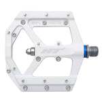 The HT ME03 Pedals are white bicycle pedals with CNC magnesium finish, featuring metal pins, a central axle, and the EVO+ system logo on the side.