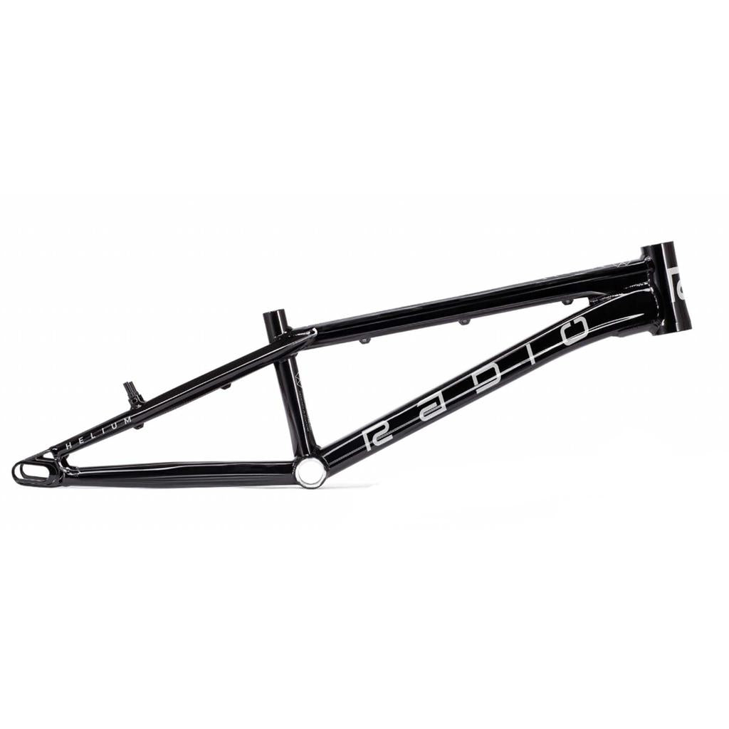 The Radio Raceline Helium 2025 Pro XXL Frame is a sleek black BMX frame made from hydroformed 6061 alloy. It showcases "Radio" in bold white lettering and is designed for lightweight agility and speed in racing.