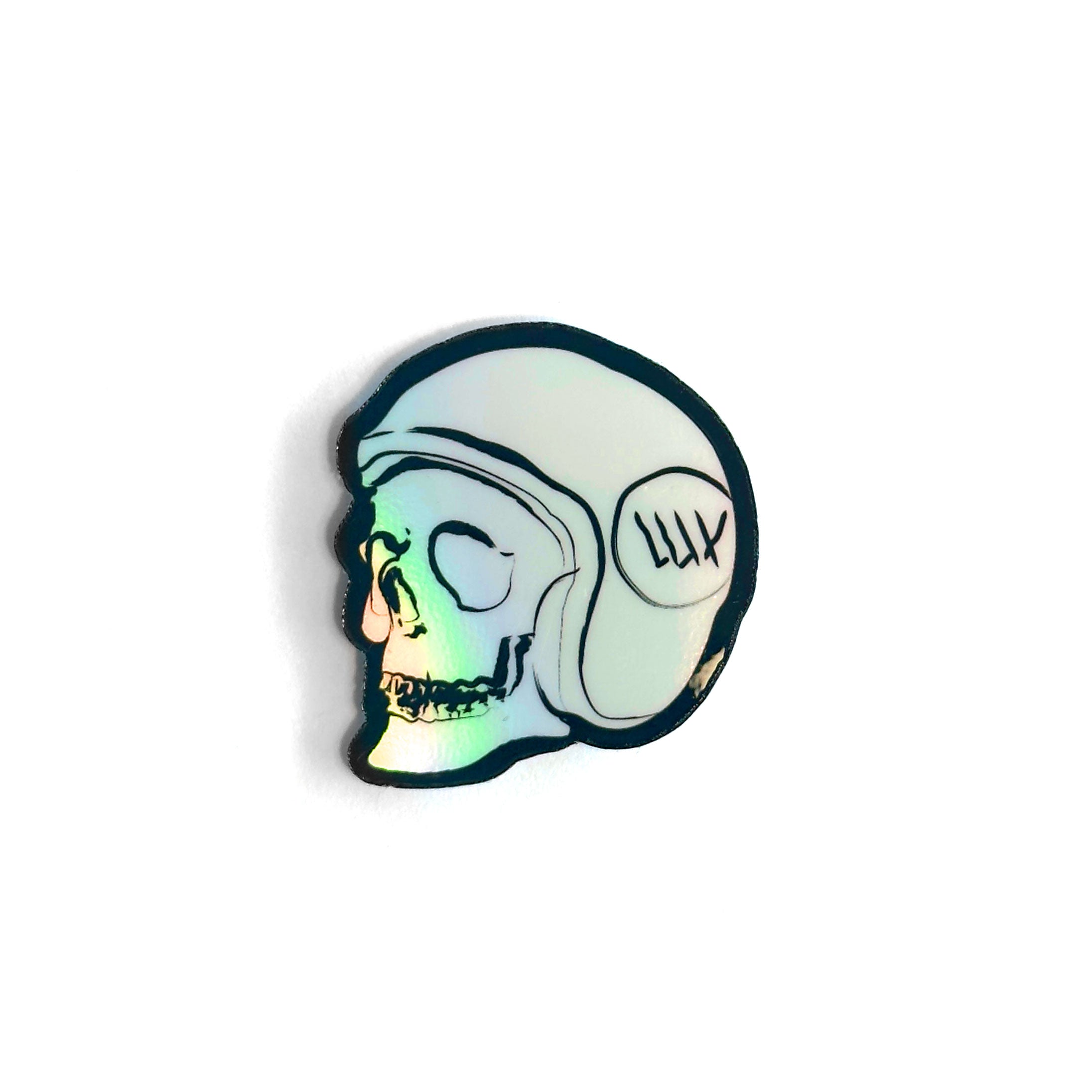 Introducing the LUXBMX Skull Holo Sticker: a reflective illustration of a skull wearing a helmet, set against a white background. Crafted from waterproof vinyl, this sticker is perfect for any BMX enthusiast or LUXBMX fan looking to add an edgy flair to their gear.