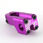 A Tangent Front Load Stem in purple, showcasing the "Tangent" logo, is meticulously CNC-manufactured and features four screws on the faceplate along with two side screws, all presented against a white background.