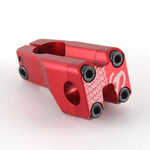 The Tangent Front Load Stem is a red BMX bike component with the brand name "Tangent" printed in white. CNC manufactured for precision, this Tangent stem features a sleek, angular design with four bolts on the front, making it perfect for race products enthusiasts.