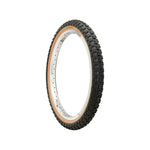 The Tioga Comp 3 Skin Wall Tyre (20 Inch) features a black knobby tread and a tan sidewall, showcased on a white background.