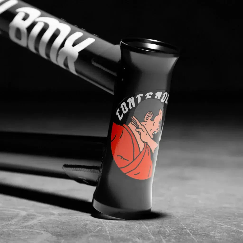 The durable Kink Contender 2 Frame showcases a black BMX frame with a graphic of a person in red attire and the word "Contend" above, embodying Dan Coller's signature style.