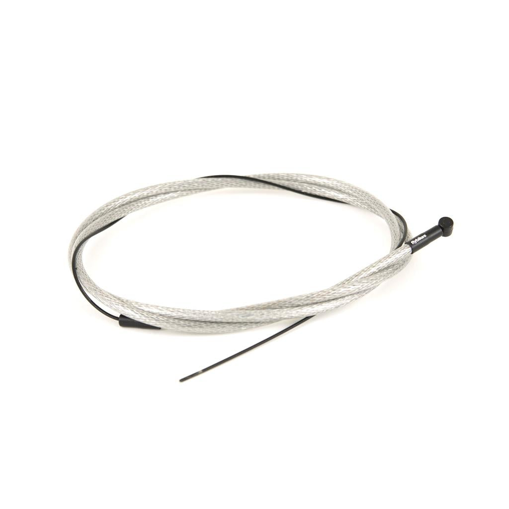 The Fly Bikes Manual Brake Cable, with coiled metallic structure and black end connectors, features a durable Teflon coating against a pristine white background.