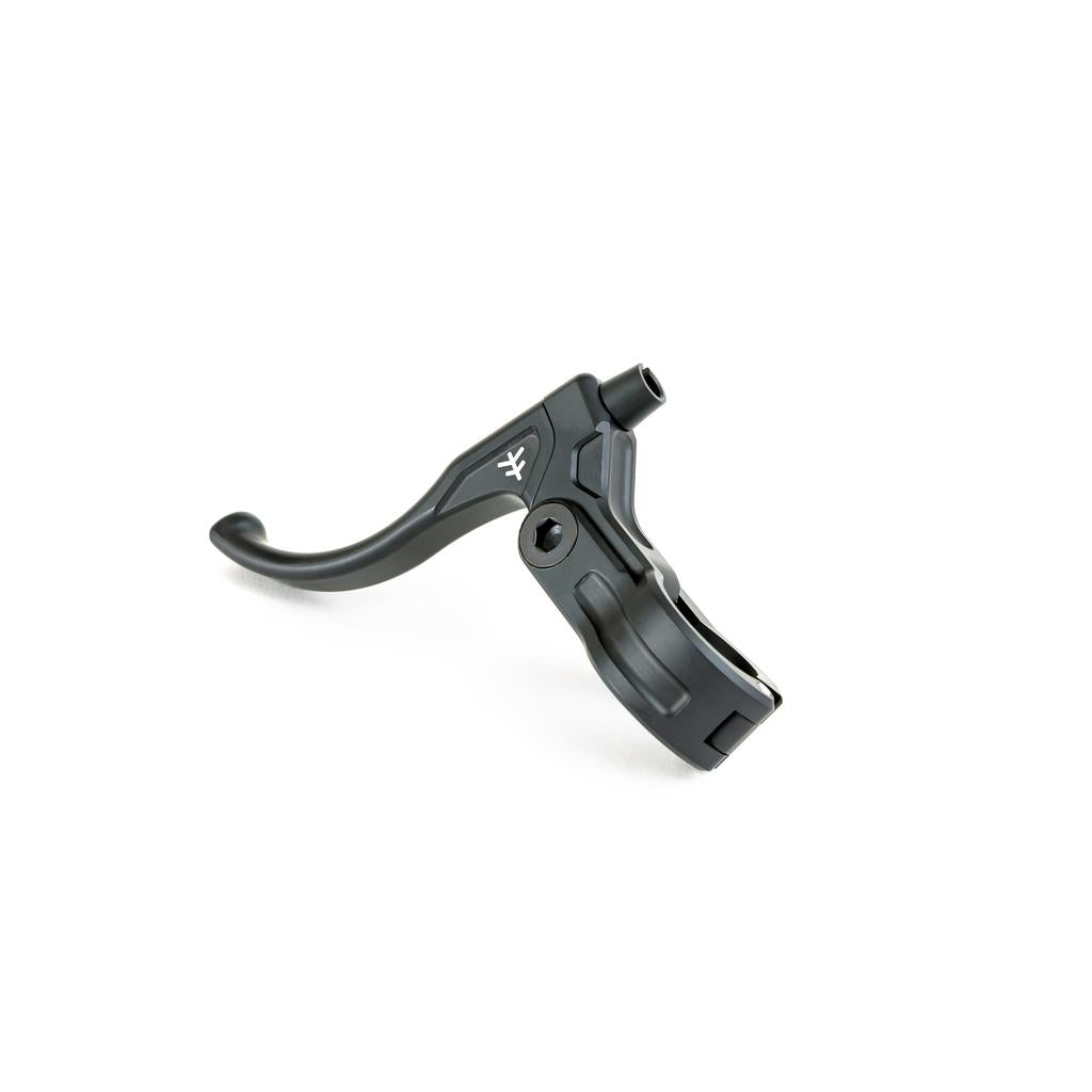 The Fly Bikes Manual CNC Brake Lever is a black brake lever made from robust 6061-T6 Aluminum with an Igus polymer bushing for smooth operation, showcased against a crisp white background.