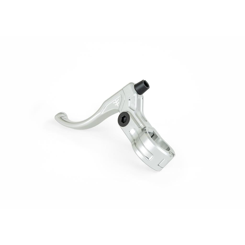 The Fly Bikes Manual CNC Brake Lever, made of durable 6061-T6 Aluminum, features a curved handle, precision CNC Lever, adjustment knob, mounting clamp, and smooth Igus polymer bushing operation—all elegantly displayed on a white background.