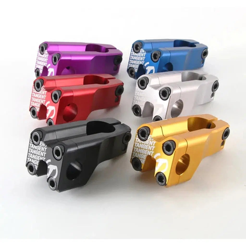 Seven vibrant Tangent Front Load Stems, CNC-manufactured, are displayed on a white background in colors including purple, blue, red, black, gold, silver, and gray.