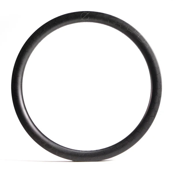 The Spectre V2 Carbon Fiber 24 Inch 36H Brakeless Rim is displayed against a plain white background, emphasizing its sleek and lightweight design.