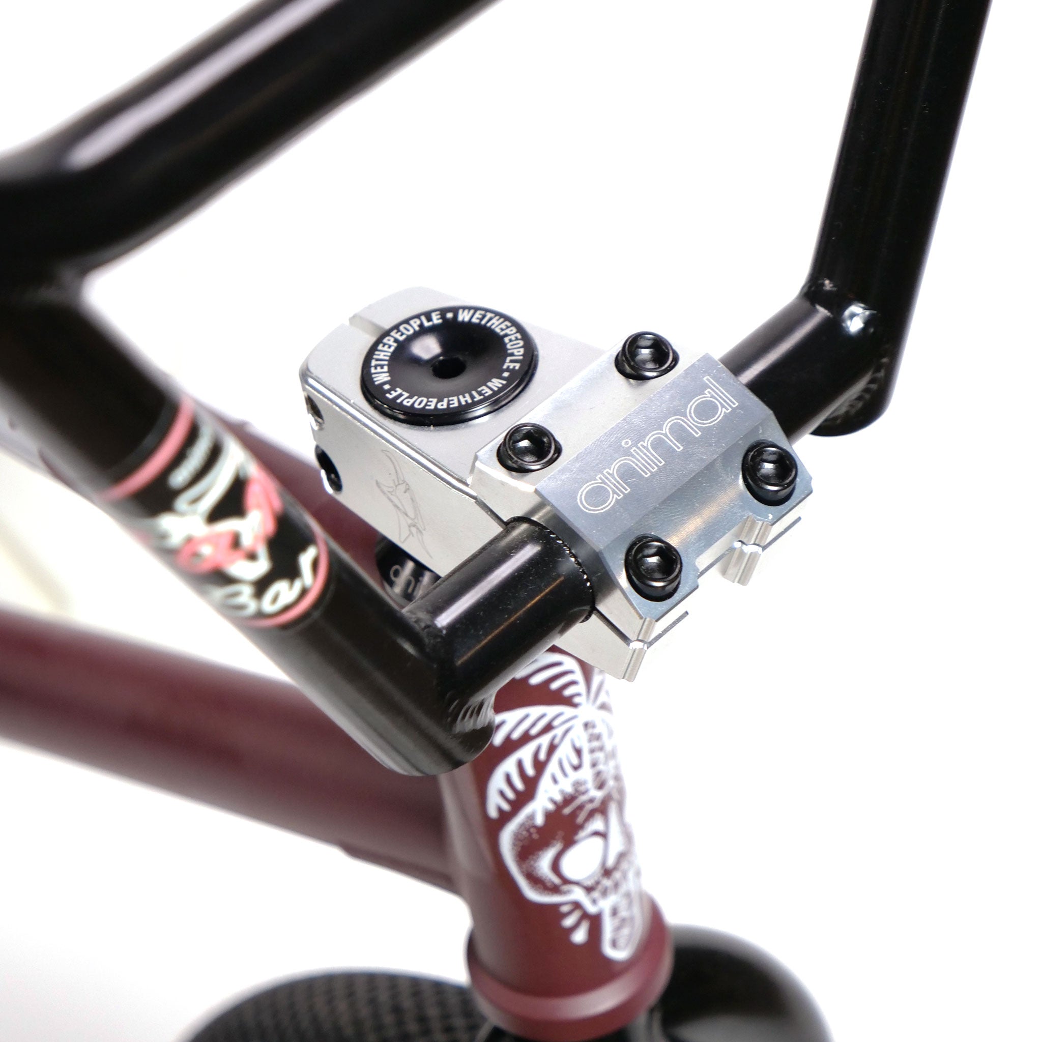 Close-up of a Federal YUNGBOYD Custom 18 Inch Bike's handlebars and stem, showcasing a silver stem with black handlebar grips, emphasizing its freestyle custom design.