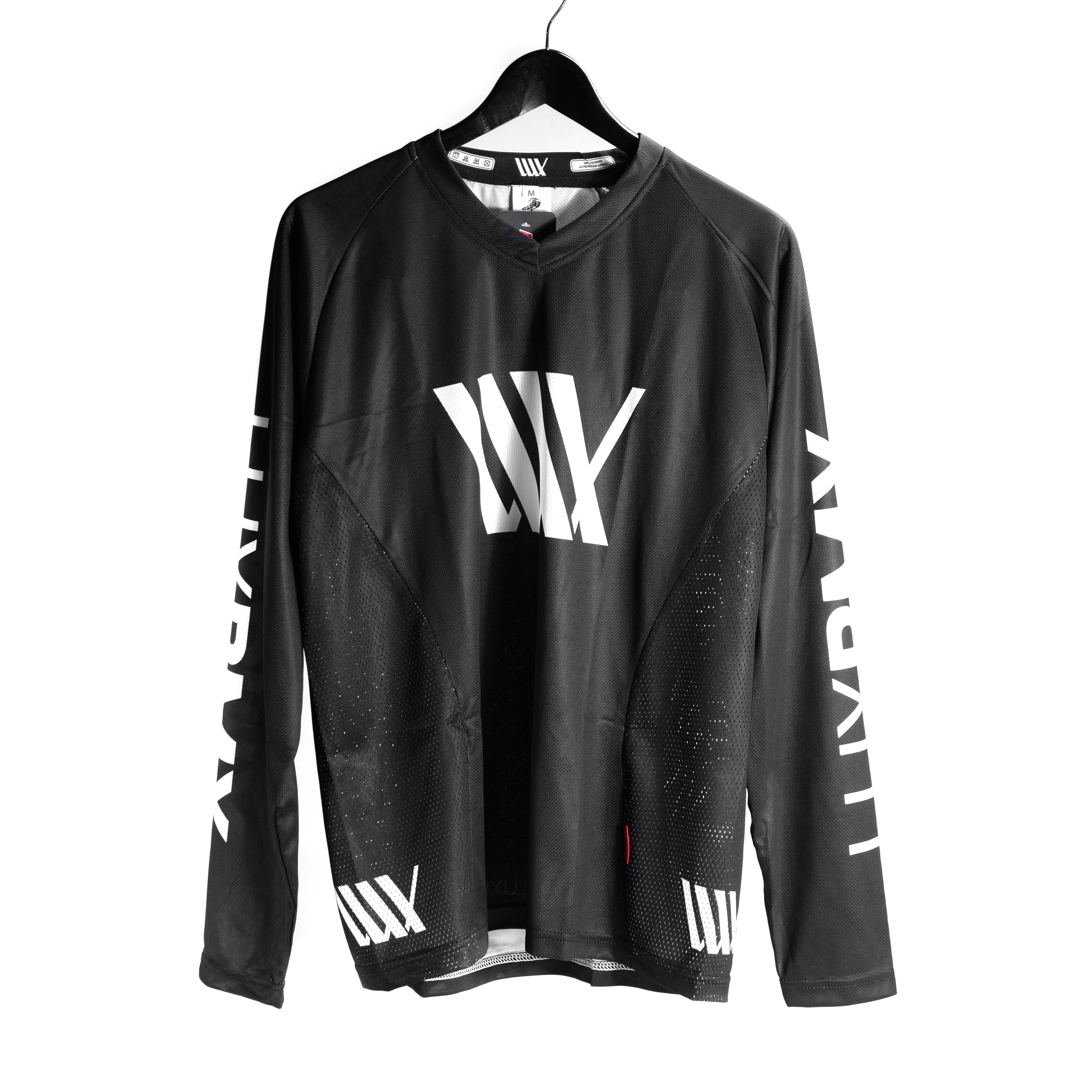 A LUXBMX Race Jersey Black/White V2 featuring white "LUXBUY" text on the sleeves and a stylized "WW" logo on the chest, displayed on a hanger.