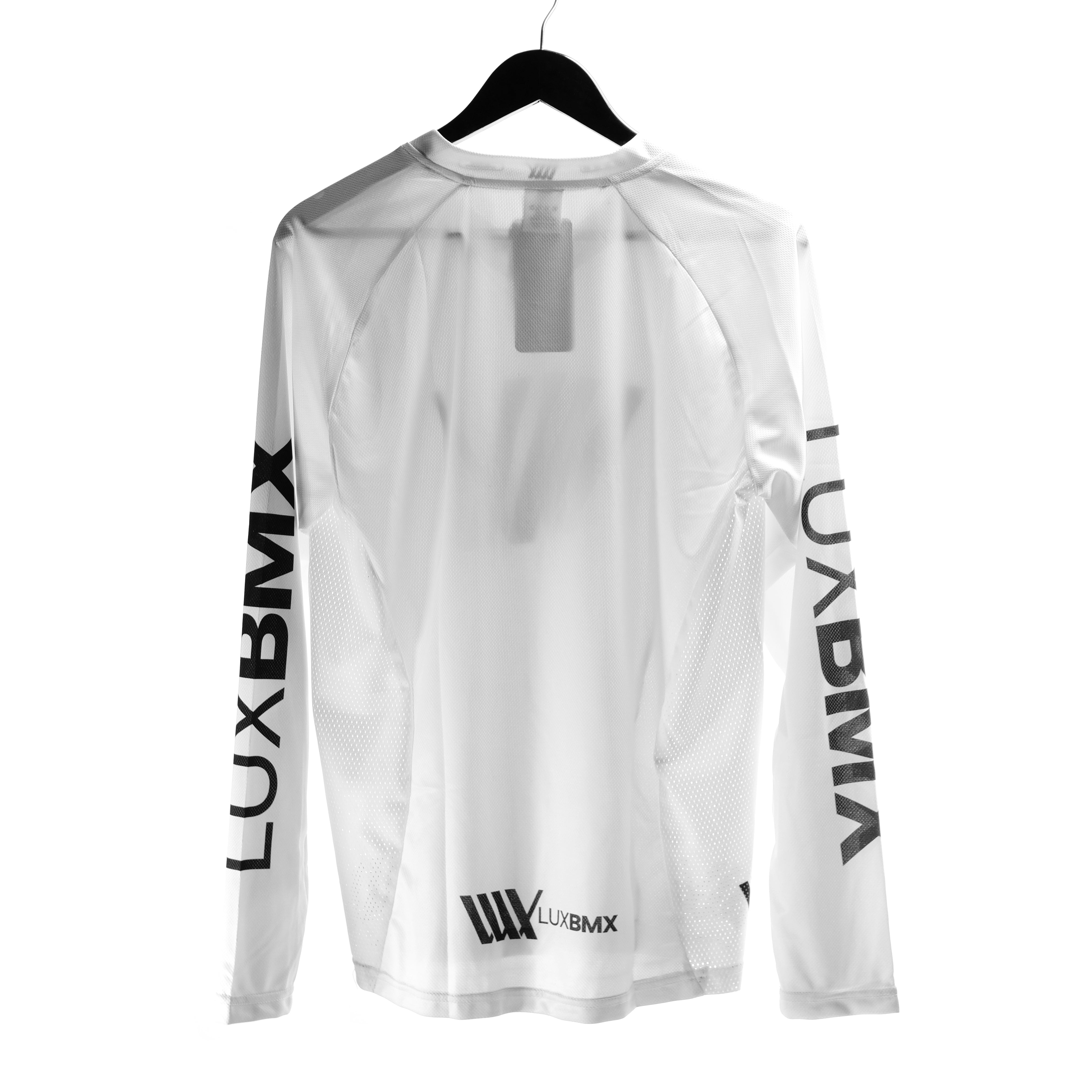 White LUXBMX Race Jersey V2 long-sleeve shirt on hanger with text on sleeves and bottom, featuring a transparent tag area on the back.