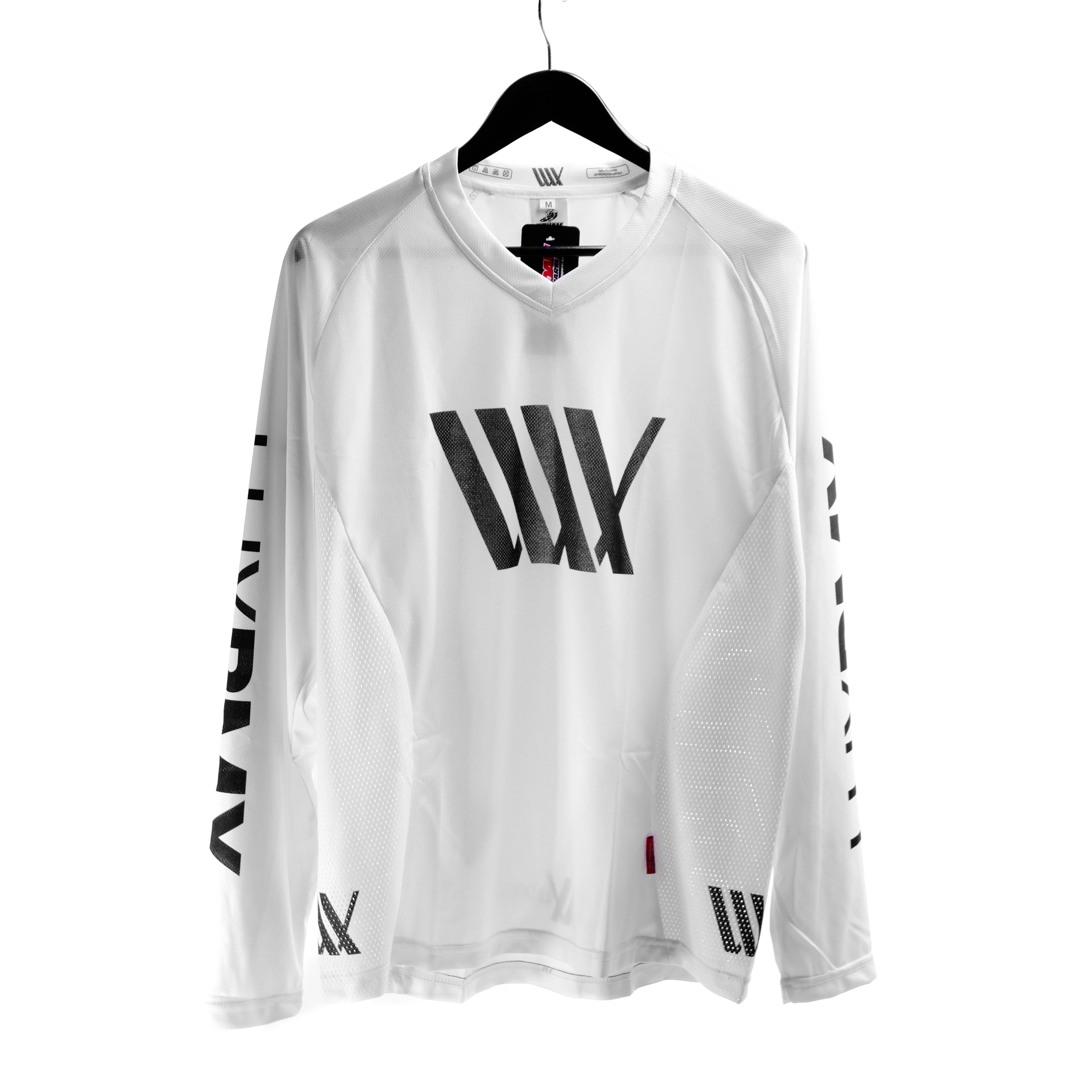 The LUXBMX Race Jersey White V2 features a bold black logo on the front and is displayed on a black hanger with a plain white background.