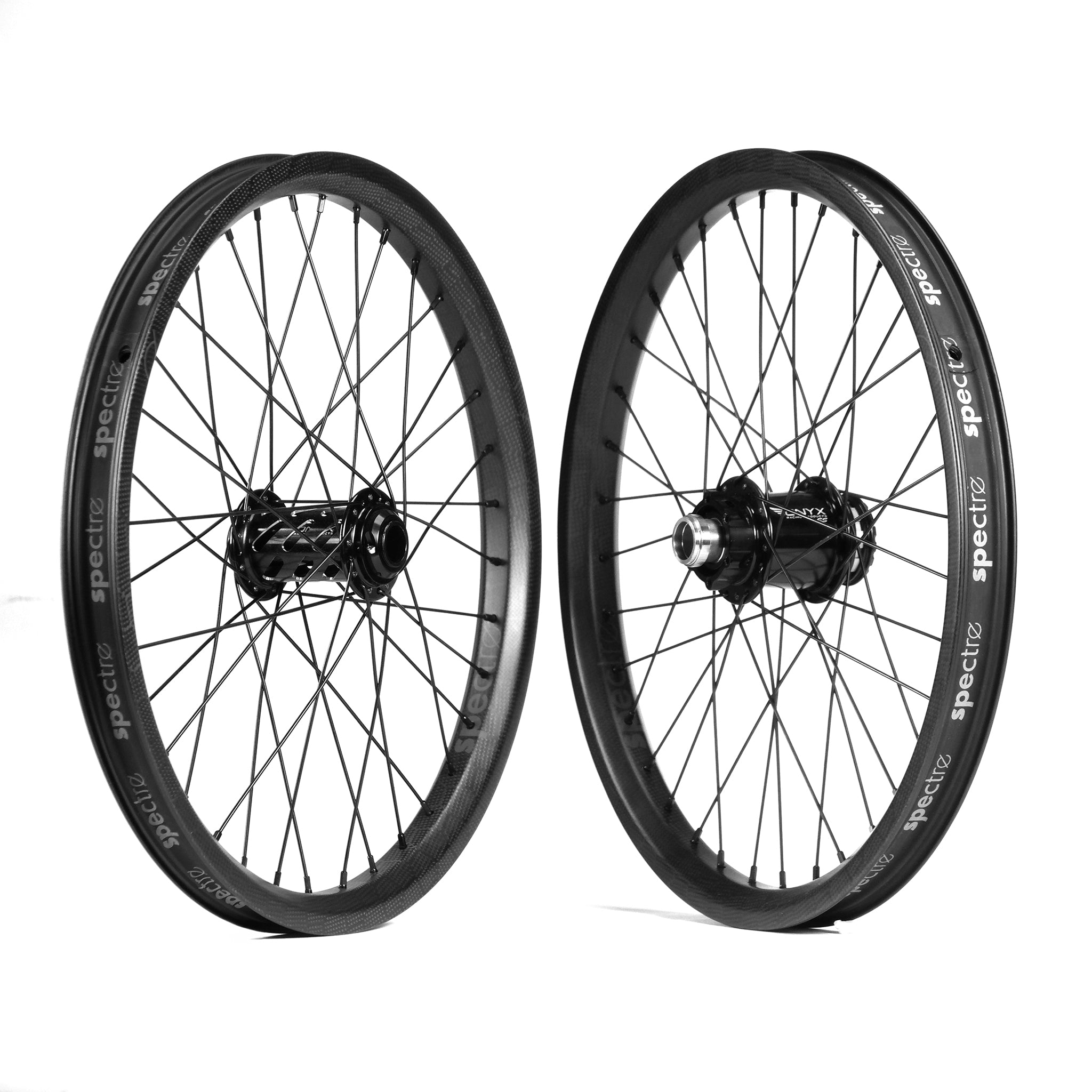 The Onyx X Spectre Carbon Battlesnake Black 20 Inch Wheelset showcases two BMX wheels with spokes, displayed upright against a white background, featuring sleek carbon fiber rims for ultimate performance.