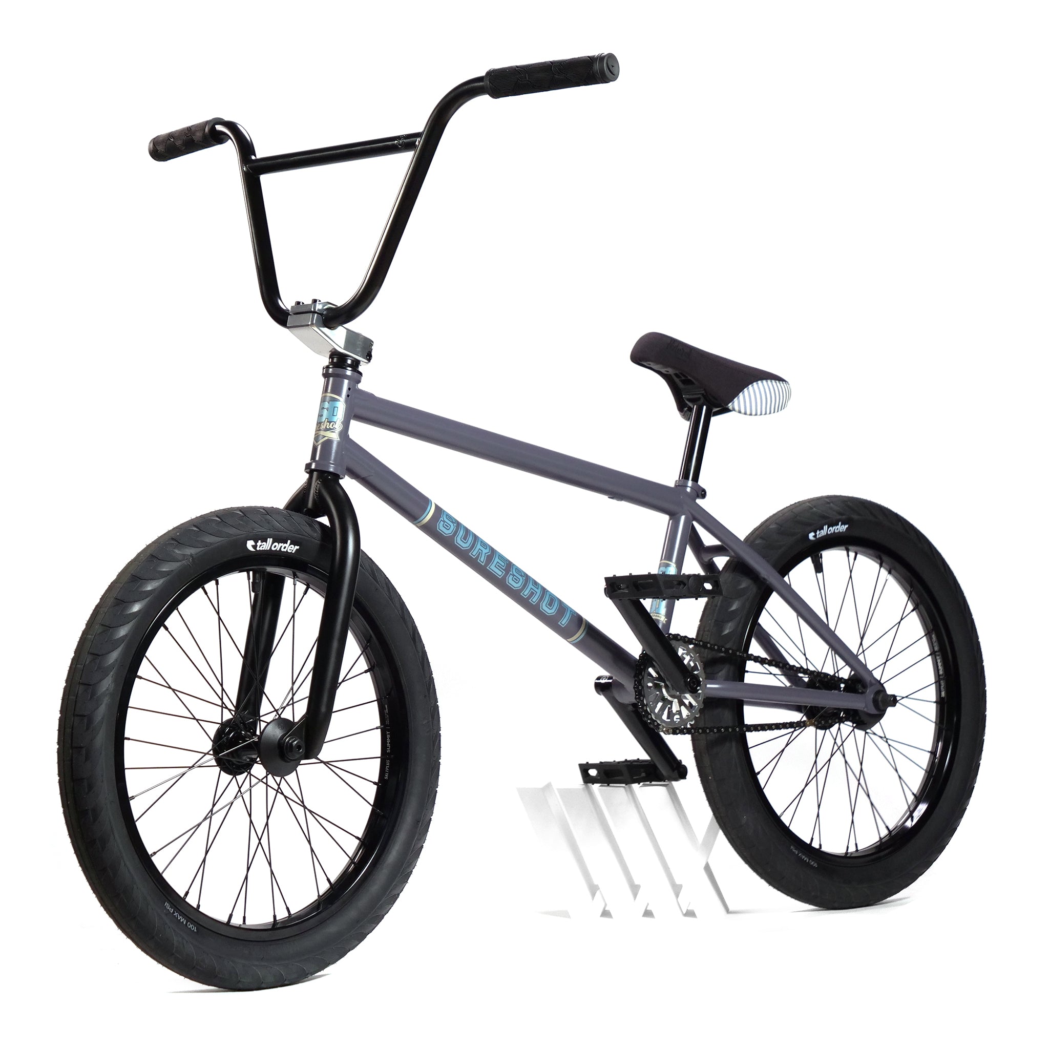 A BSD Long Shot Custom BMX Bike in black, featuring thick tires, high handlebars, and a striped seat, is angled to the left on a white background.