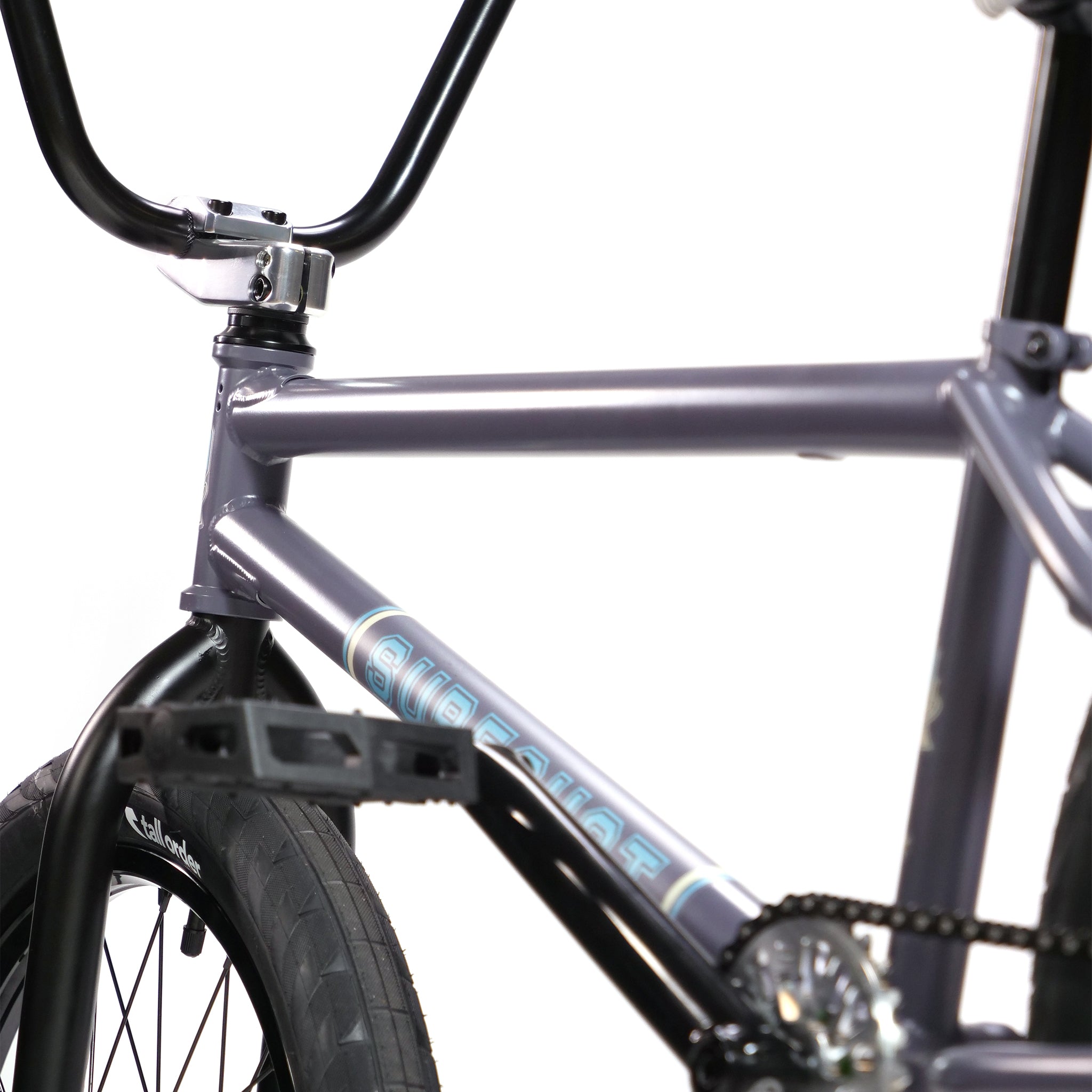 Close-up of the grey BSD Long Shot Custom BMX Bike highlighting the frame, handlebars, and front wheel with a "Sub Rosa" sticker on the frame.