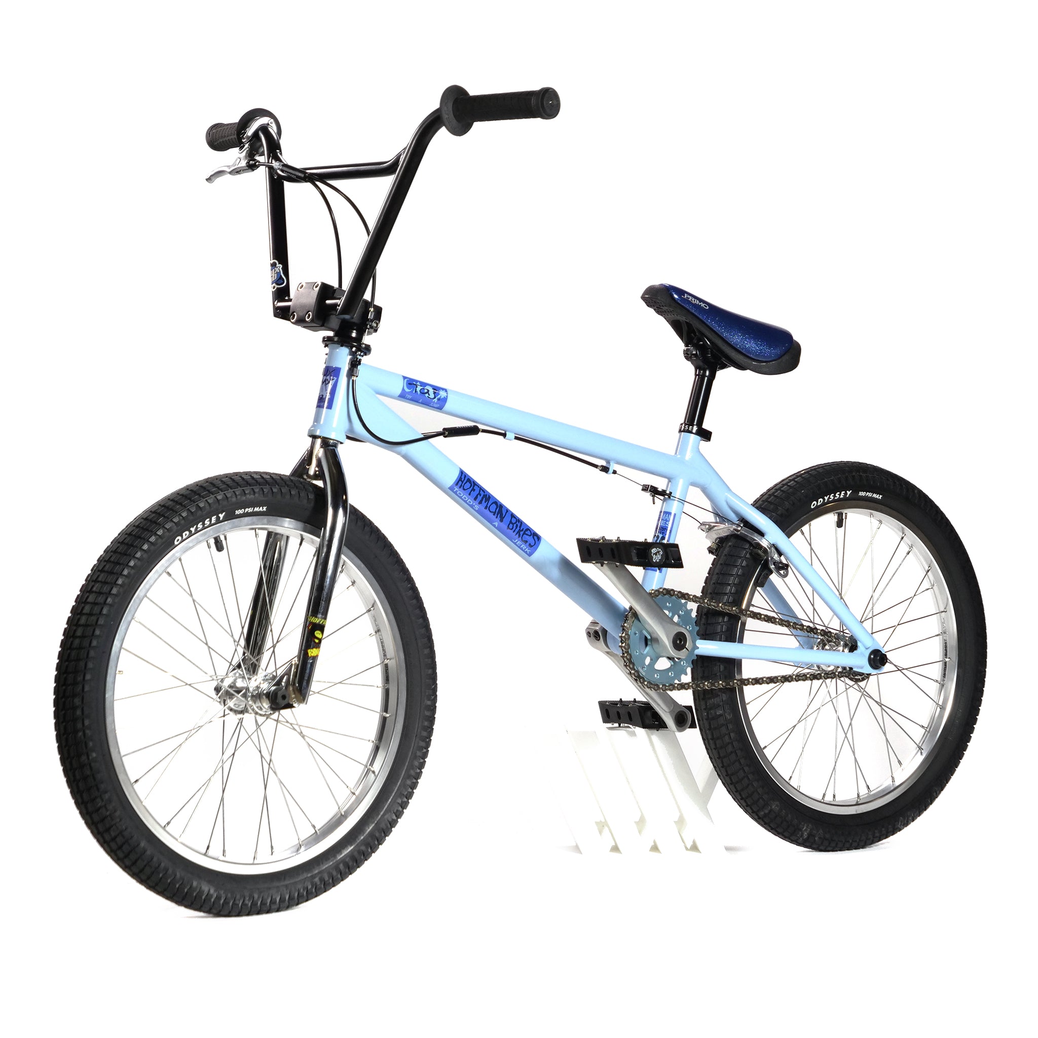 The Hoffman TAJ Trend Adjacent Joy 20 Inch Custom Bike features a blue BMX freestyle design with black handlebars, a matching blue seat, and two pegs on each wheel, capturing the classic style of iconic Hoffman bikes.