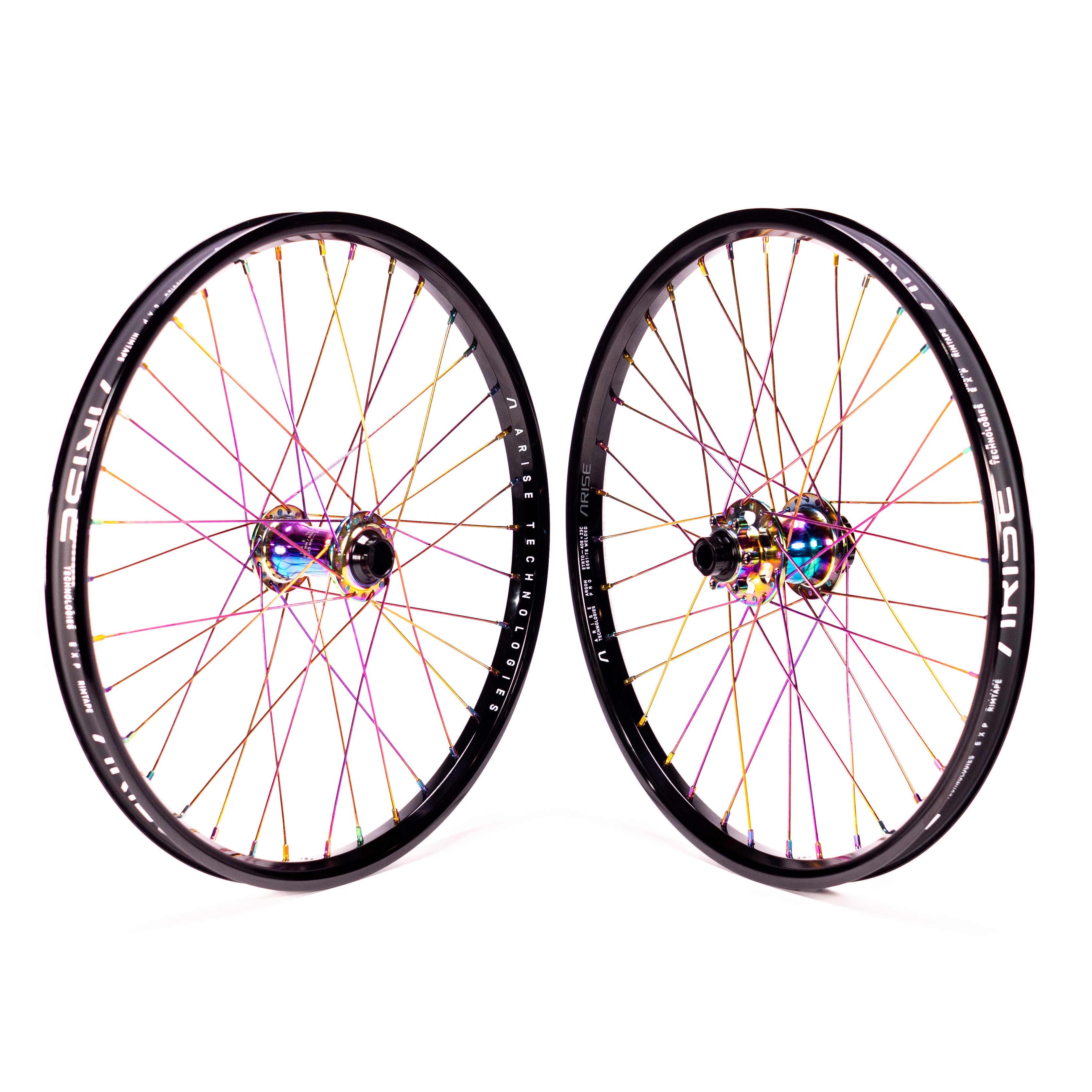 Two vibrant Arise Echo Oilslick Pro 20 Inch wheels, featuring black rims and multicolored spokes, are side by side against a white background.