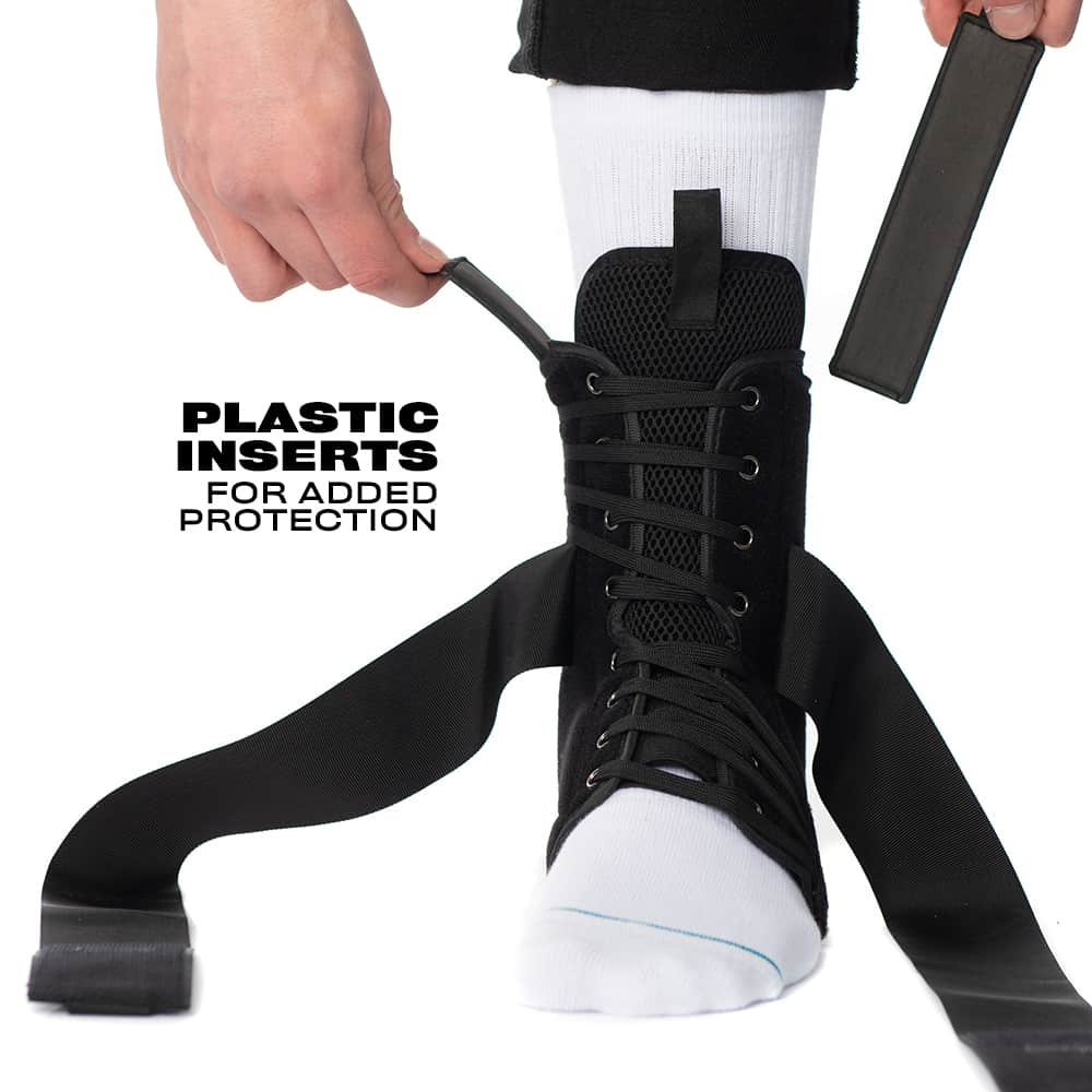A person is tightening the straps on a Space Brace 2.0 Ankle Brace (Single) with Quick Lace Technology and plastic inserts for added protection, worn over a white sock.