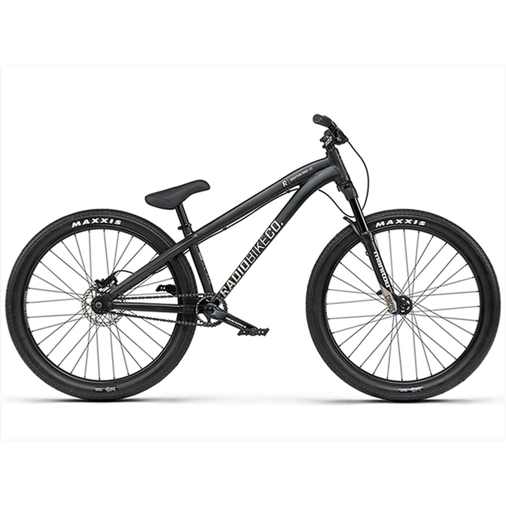 A black hardtail mountain bike with Maxxis tires, "Radio 26 Inch Griffin Pro Bike" branding on the frame, and Race Face parts.