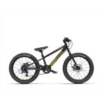 The Radio 20 Inch Zuma Bike is a black children's MTB bike featuring yellow "RADIOBIKE CO." lettering on its lightweight alloy frame. It is equipped with large knobby tires, a front suspension fork, and a handlebar complete with brake and gear levers.