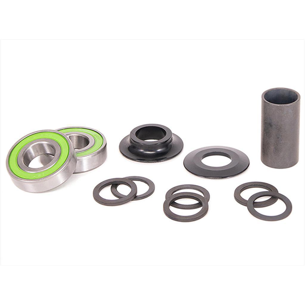 The Salt Rookie Mid Bottom Bracket is a collection of mechanical components featuring two sealed ball bearings, various washers, a cylindrical spacer, and small metal parts, all set against a white background.