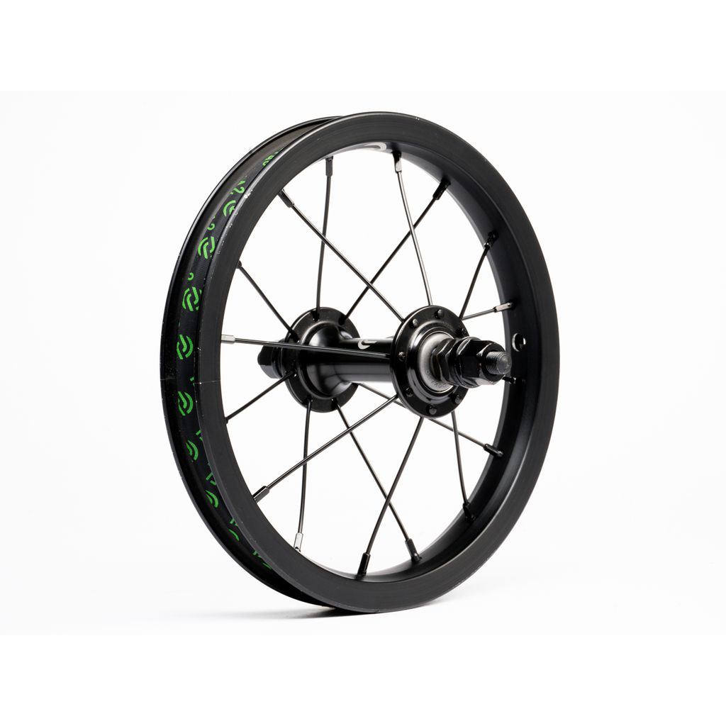 The Salt Rookie 12 Inch Front Wheel, featuring a black rim, multiple spokes, and a green patterned tire, stands upright on a white background.