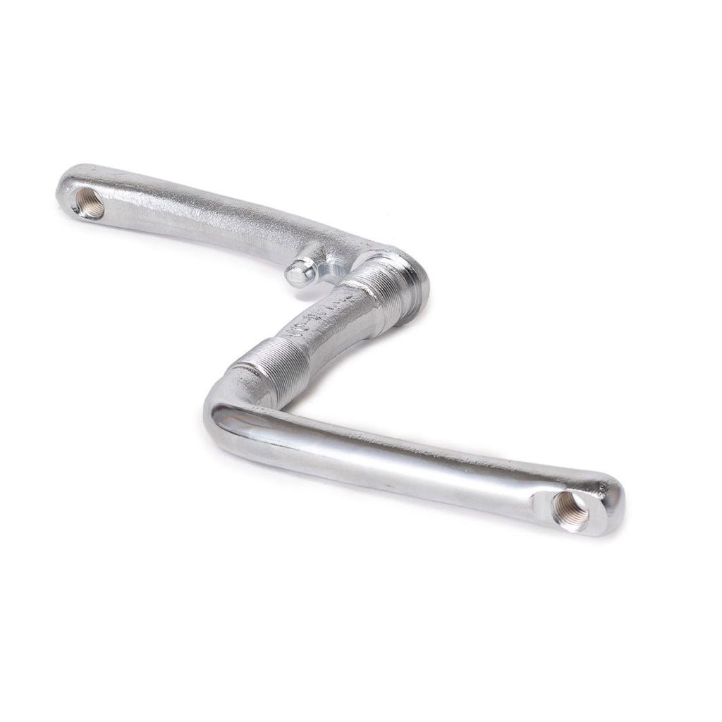 The Salt One Piece Crank, a forged metallic bicycle crank with two arms, perfect for your restoration project, is laid on a white background.