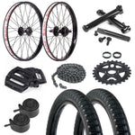 The LUXBMX Selects: Eclat x Salt Pro Drive Train Kit, featuring 20-inch wheels, handlebars, pedals, chain, sprocket, inner tubes, and tires is artfully arranged on a white background.