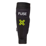 Fuse Omega Shin Whip Pads with yellow X design and logo on the front, enhanced with Kevlar protection for superior durability.