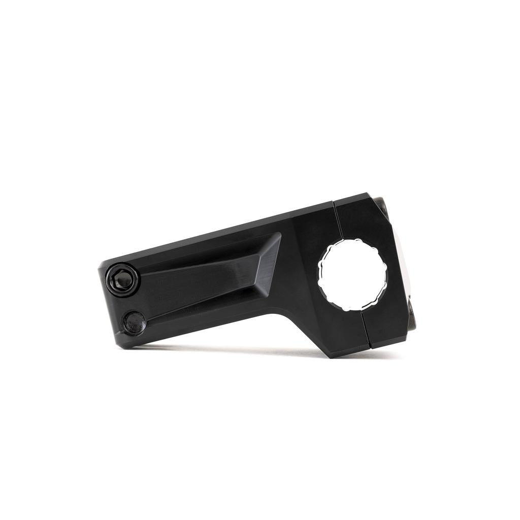 The Fly Bikes Volcano Front Load Stem, made from 6061-T6 Aluminum, features a sleek black angular design with precision front loading. It is securely fastened by two bolts and displayed against a pristine white background.