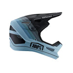 Side view of a blue and black 100% Status Helmet Decline Grey, offering full face protection and prominently displaying the "100%" brand. Perfect for youth BMX riders.