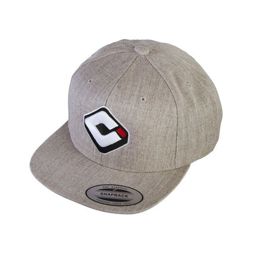 The ODI Icon Logo Hat is a gray snapback cap with a flat brim, showcasing a stylized "C" logo on the front and an adjustable snapback closure for an ideal fit.