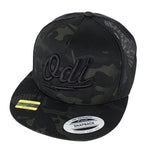 The ODI Scorch camouflage snapback hat features a bold design with "Odi" embroidered on the front, a black mesh back, and an adjustable snapback closure for a perfect fit.