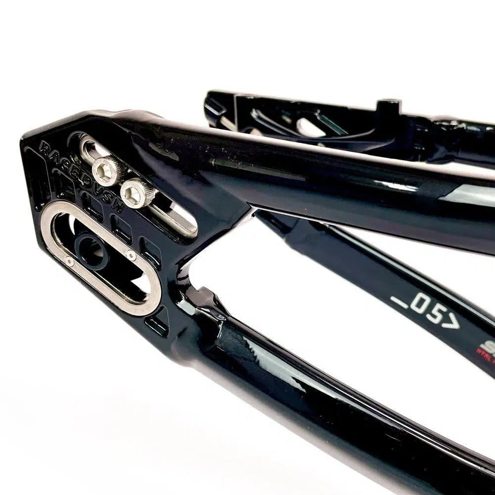 Close-up view of a black aluminium race frame showcasing a part of the rear dropout area, exemplifying the precision engineering of the Staystrong V5 Disc Pro XXL Frame.