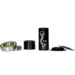 The Terrible One Mid Bottom Bracket includes a set of BMX bike parts like a headset, spacer, bearings, and a black top cap featuring a skeleton design labeled "T-1." This set complements cranks and BB components to enhance your ride.