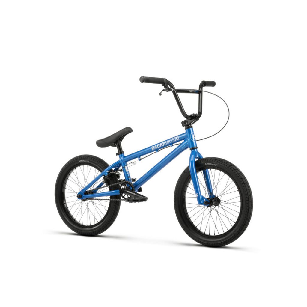 The Radio Dice 18 Inch Bike is a blue BMX bike featuring a black seat, black handlebars, and Salt Tracer Tyres, with the brand name "RADIO" prominently displayed on the frame.