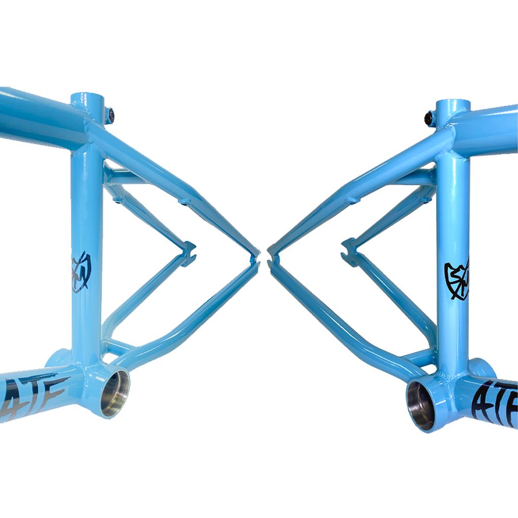 Two S&M ATF 22 inch frames, both in sky-blue, are symmetrically positioned facing each other against a white background. They proudly display their brand logos and showcase their USA-made manufacturing.