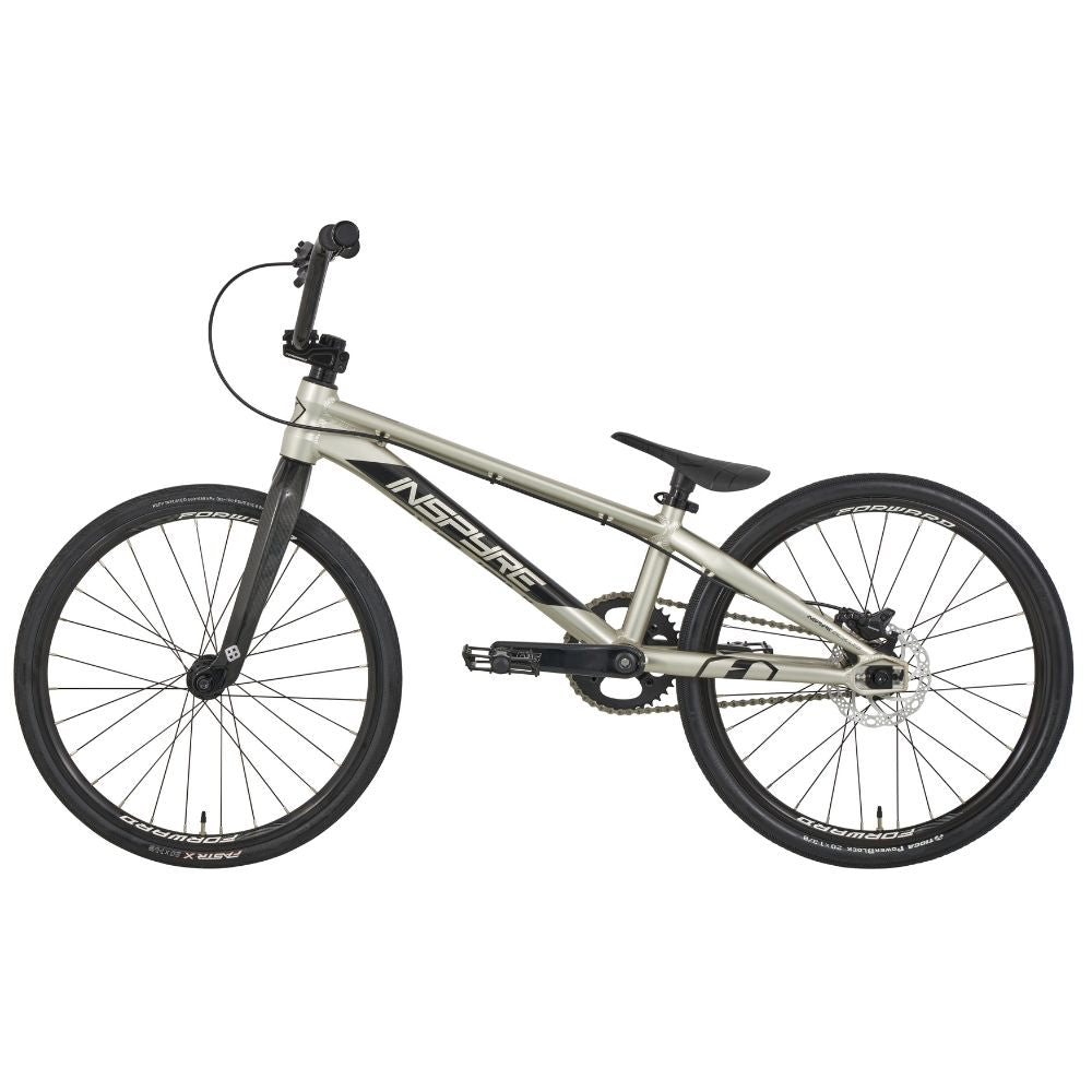 The Inspyre Evo-C Disc Expert XL Bike 2025, a sleek silver BMX with black handlebars and tires, showcases its race design against a white background, featuring advanced hydraulic disc brakes for superior performance.