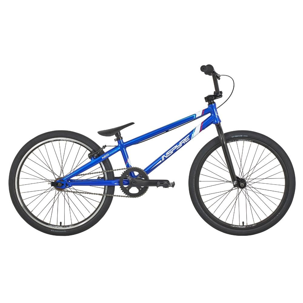 Side view of the Inspyre Neo Pro Cruiser Bike, showcasing its blue color with an aluminum frame, black tires, and white accents on the frame.